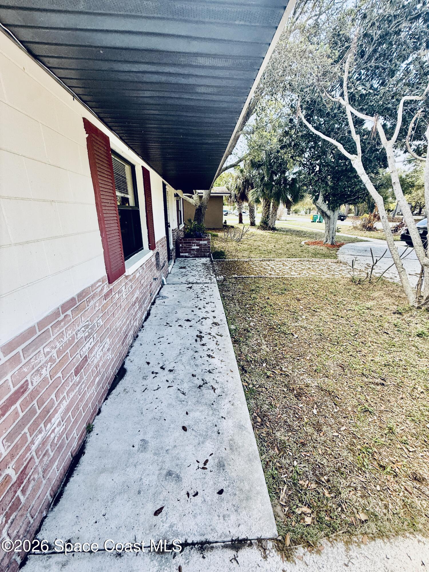 410 South Tropical Trail Merritt Island, FL 32952 - Photo 6 of 28 20260309_161221932_iOS