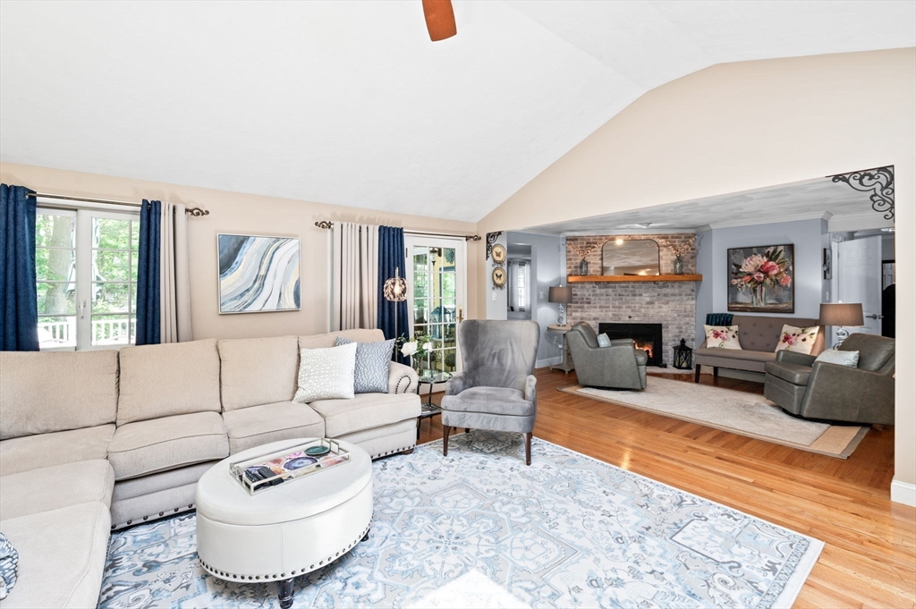 9 Sagamore Road Ipswich, MA 01938 - Photo 11 of 42 a living room with furniture and a fireplace