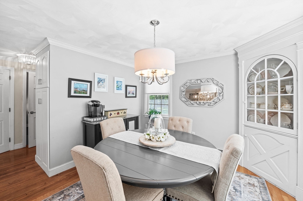 9 Sagamore Road Ipswich, MA 01938 - Photo 18 of 42 a view of a dining room with furniture window and wooden floor