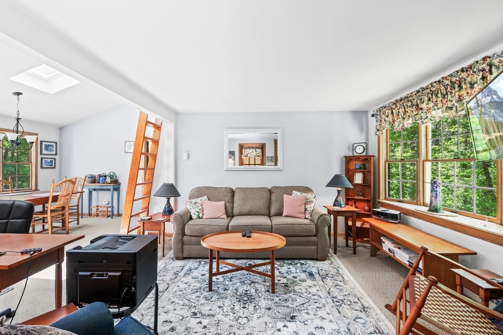 9 Sagamore Road Ipswich, MA 01938 - Photo 29 of 42 a living room with furniture and a large window