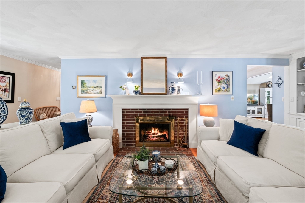 9 Sagamore Road Ipswich, MA 01938 - Photo 8 of 42 a living room with furniture and a fireplace