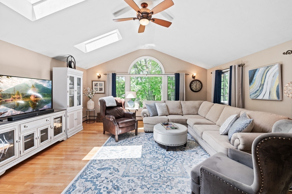 9 Sagamore Road Ipswich, MA 01938 - Photo 9 of 42 a living room with furniture and a flat screen tv