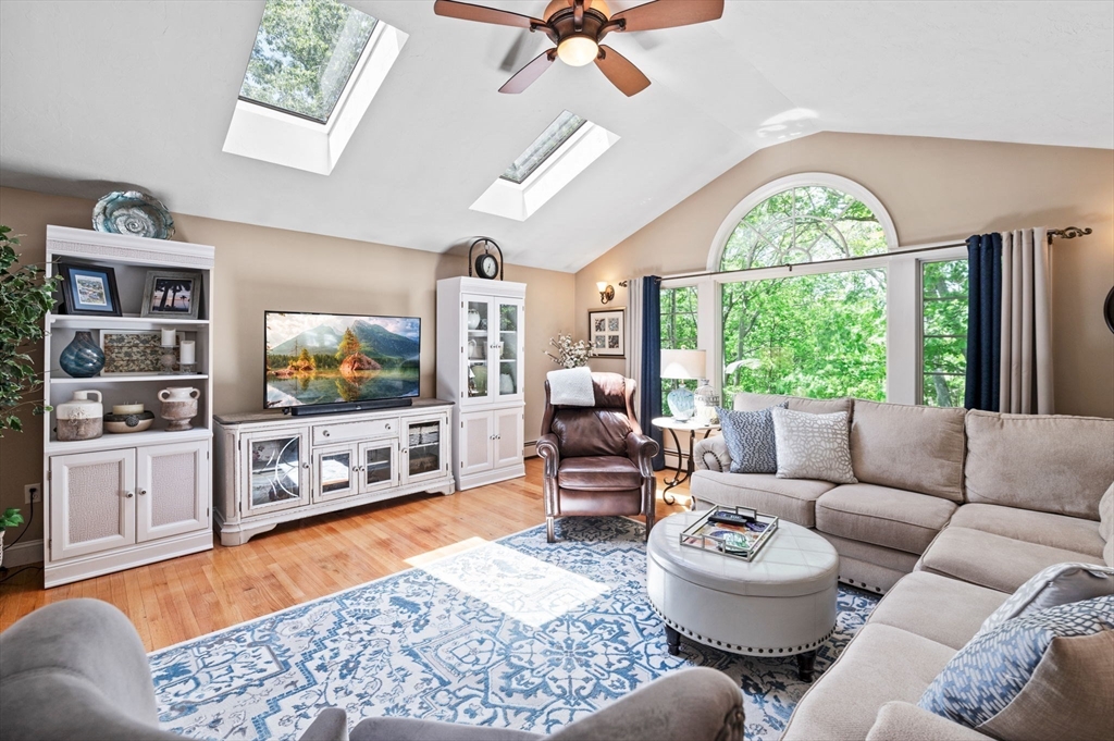 9 Sagamore Road Ipswich, MA 01938 - Photo 10 of 42 a living room with furniture and a flat screen tv