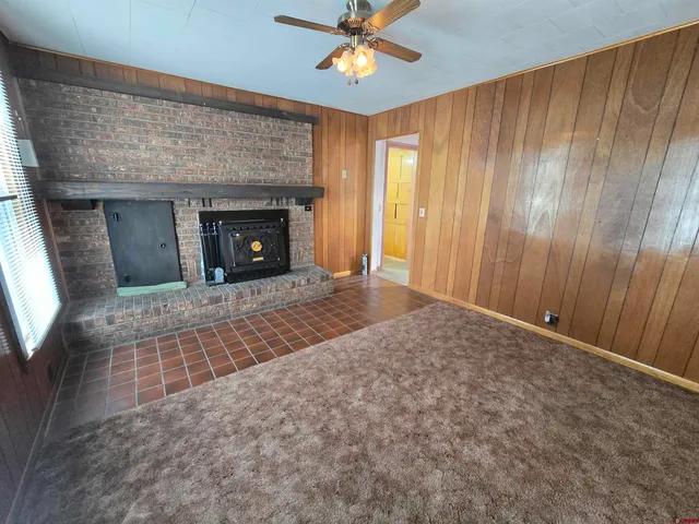 a fireplace with a clock on it