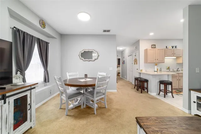 a view of a dining room with furniture