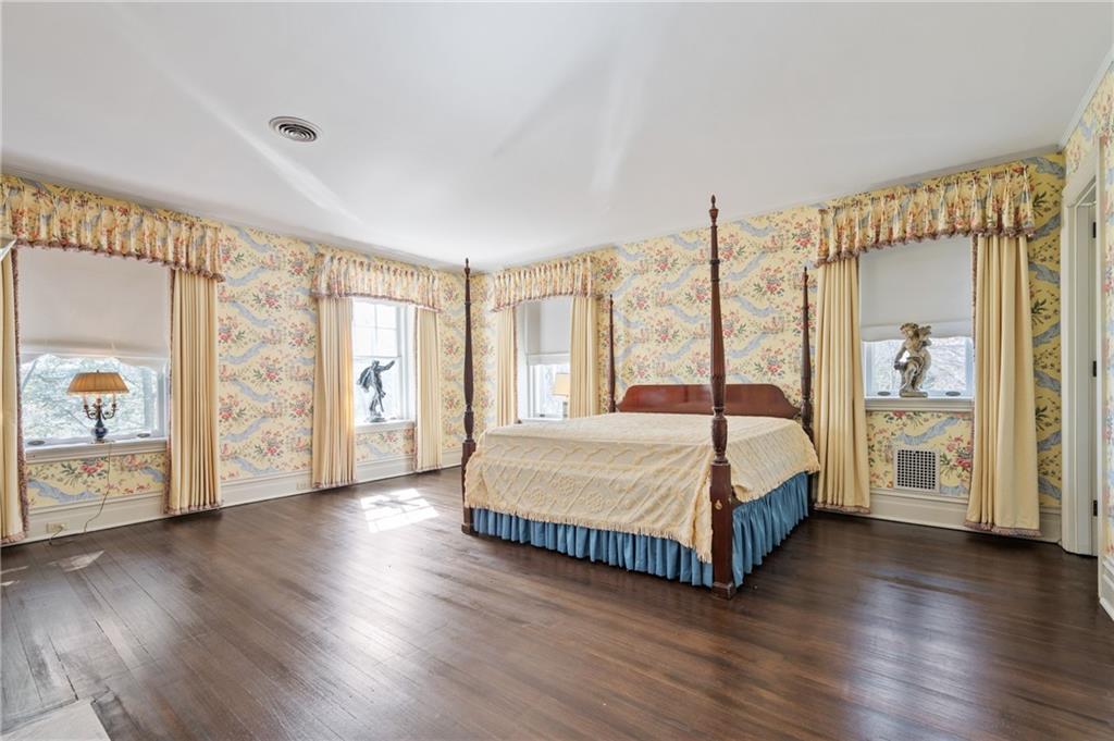9 Little Sewickley Creek Road Sewickley, PA 15143 - Photo 22 of 34 a bedroom with a large bed and a large window