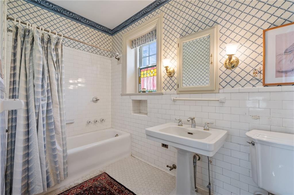 9 Little Sewickley Creek Road Sewickley, PA 15143 - Photo 28 of 34 a bathroom with a sink and a bathtub