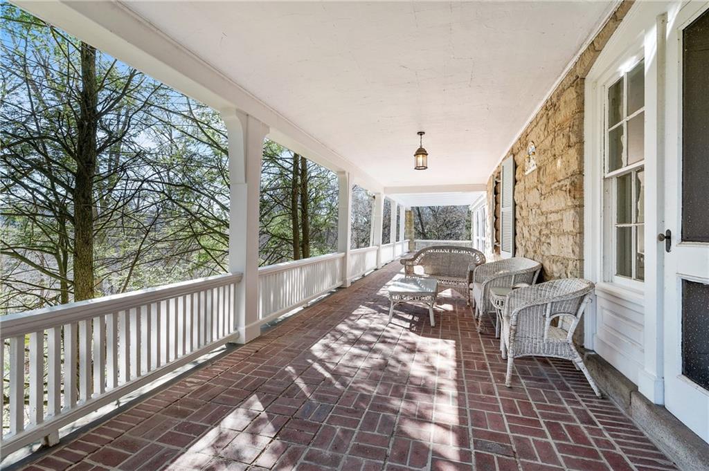 9 Little Sewickley Creek Road Sewickley, PA 15143 - Photo 10 of 34 a balcony with furniture and large windows