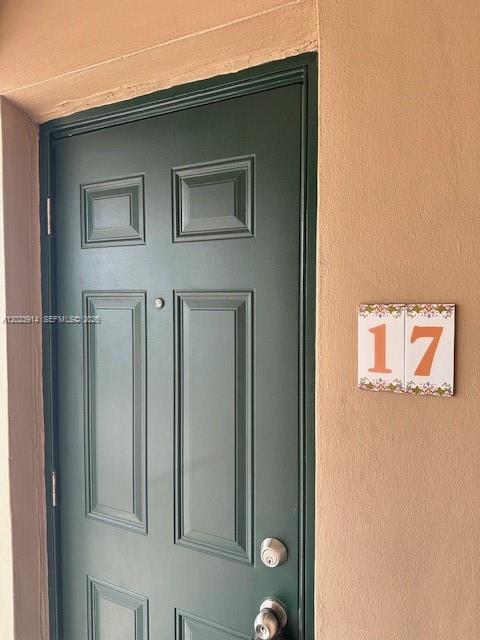 1400 Douglas Road, Unit 17 Coral Gables, FL 33134 - Photo 5 of 16 a front view of a house