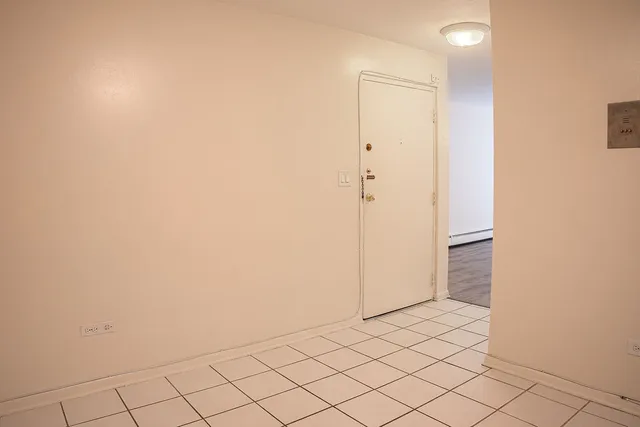 a view of small space with wooden floor