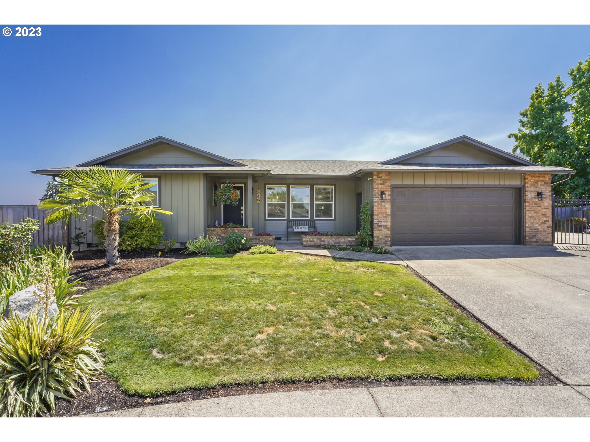 349 72nd Place Springfield, OR 97478 - Photo 1 of 42 a view of a house with garden