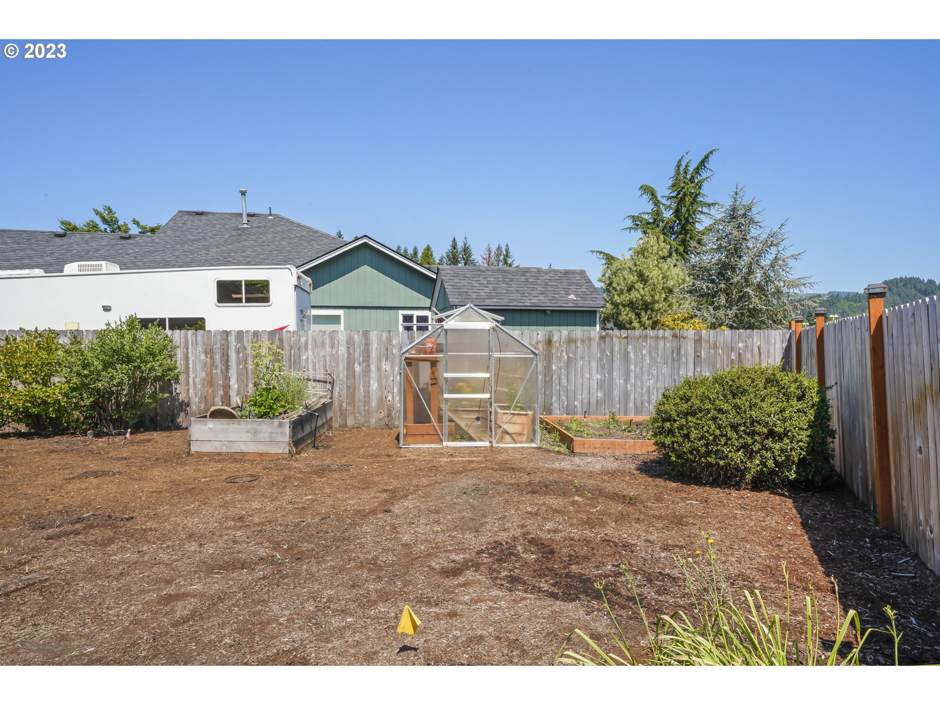 349 72nd Place Springfield, OR 97478 - Photo 34 of 42 a backyard of a house with lots of green space