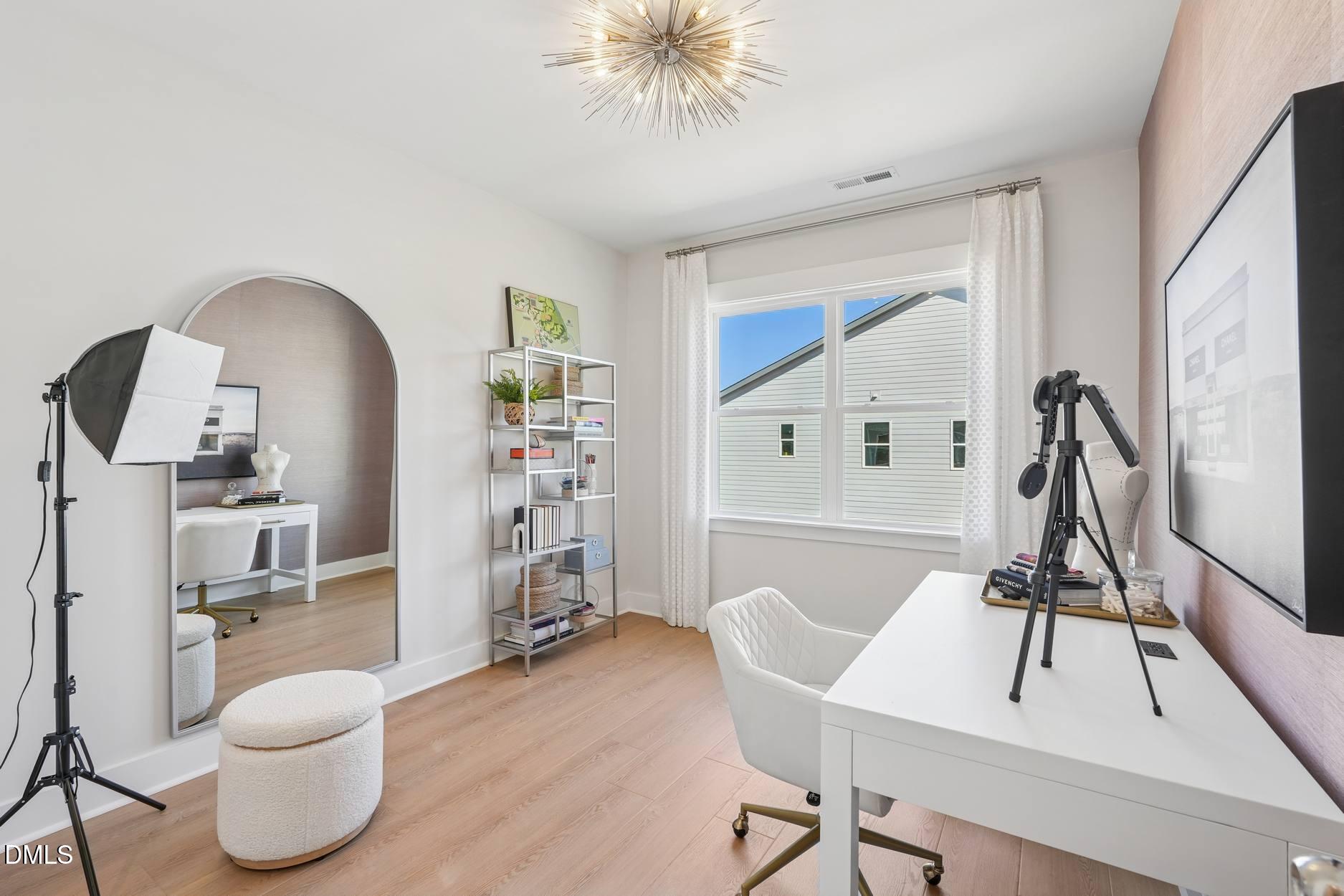 72 Wandering Way Pittsboro, NC 27312 - Photo 11 of 20 a living room with furniture and a wooden floor