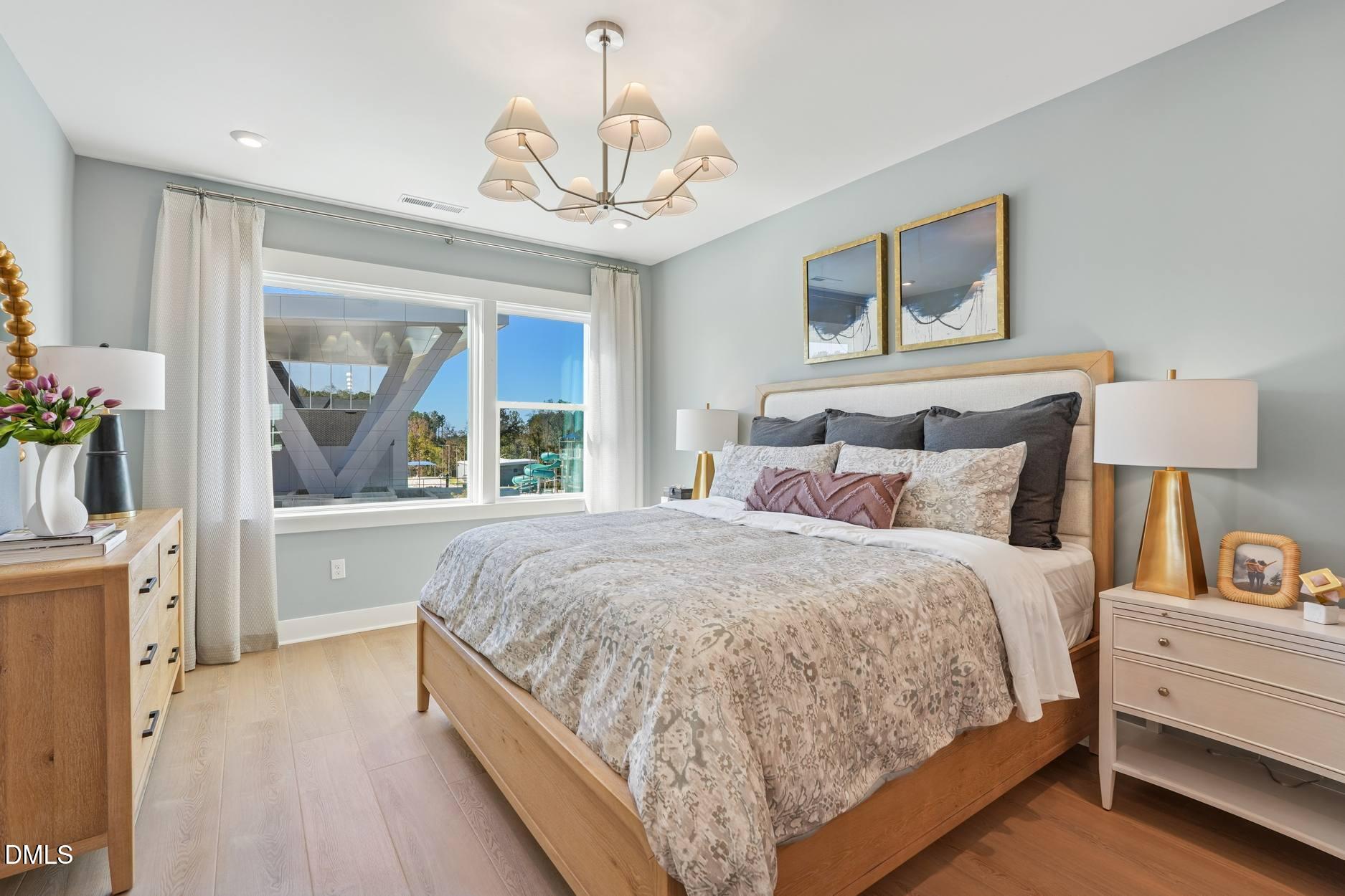 72 Wandering Way Pittsboro, NC 27312 - Photo 15 of 20 a bedroom with a large bed and a window