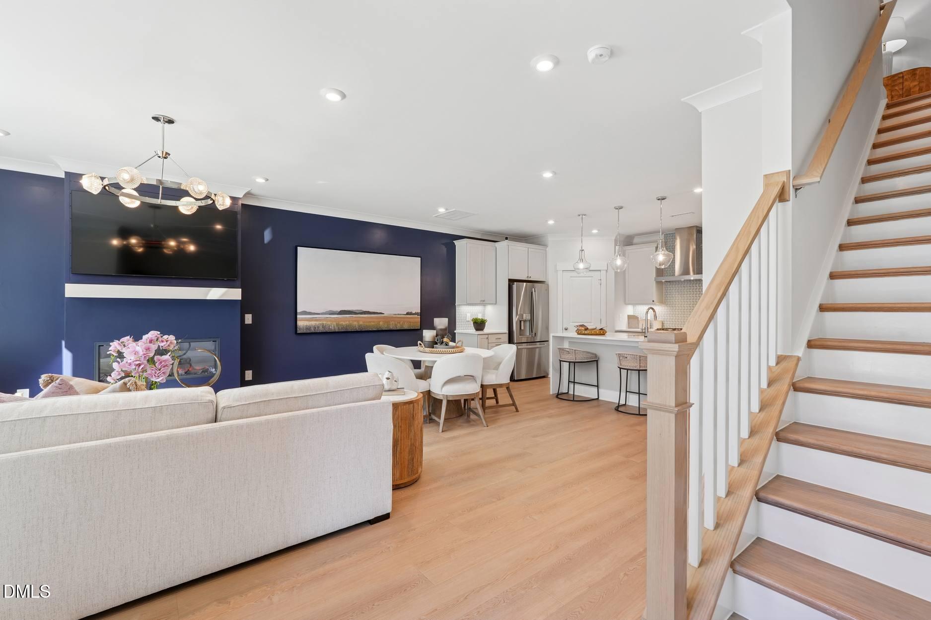 72 Wandering Way Pittsboro, NC 27312 - Photo 2 of 20 a living room with furniture and a flat screen tv