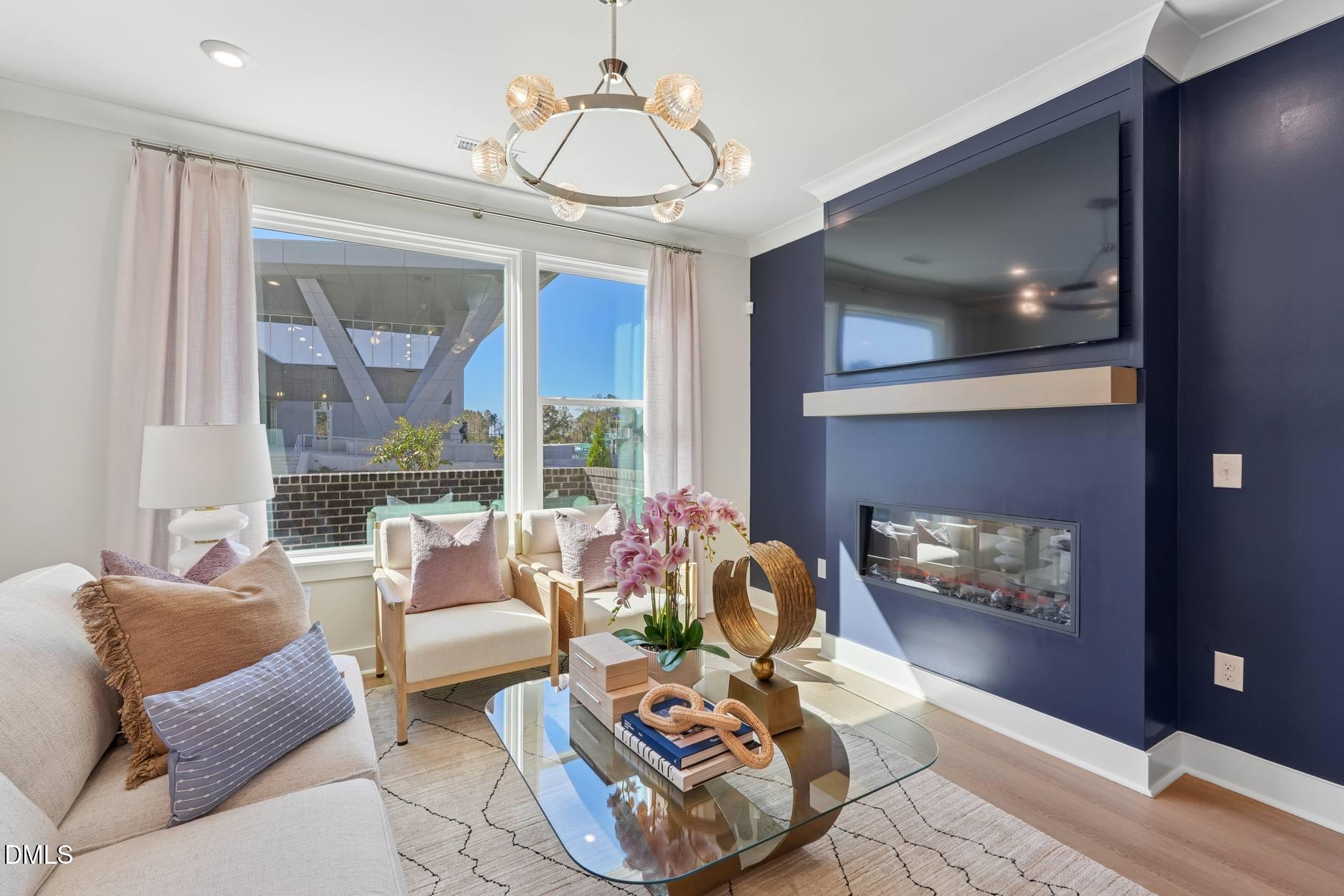 72 Wandering Way Pittsboro, NC 27312 - Photo 4 of 20 a living room with furniture and a fireplace