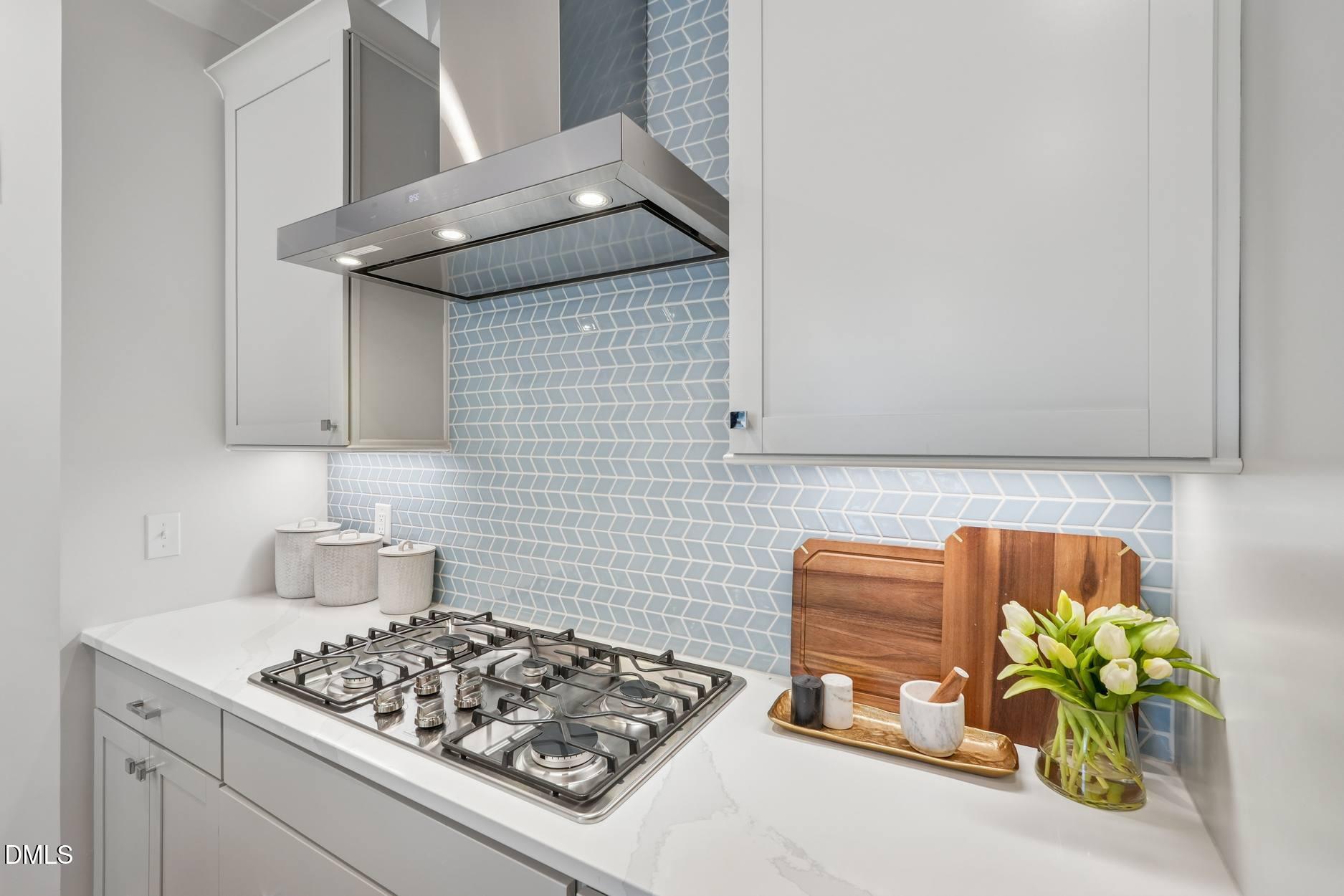 72 Wandering Way Pittsboro, NC 27312 - Photo 7 of 20 a stove top oven sitting inside of a kitchen