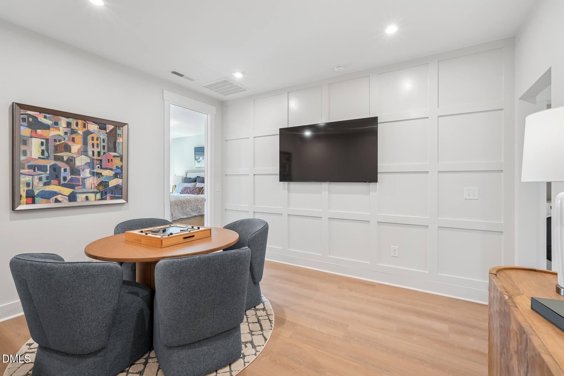 72 Wandering Way Pittsboro, NC 27312 - Photo 10 of 20 a living room with furniture and a flat screen tv
