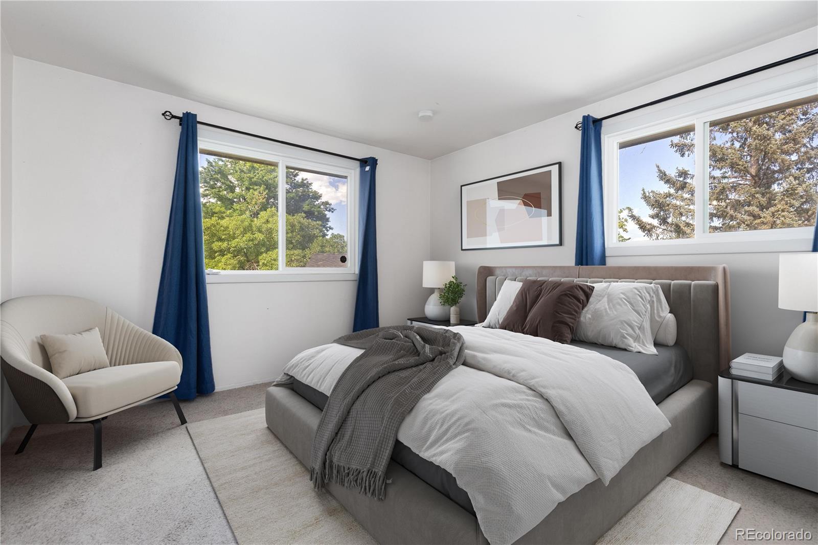 4374 East Peakview Circle Centennial, CO 80121 - Photo 15 of 45 a bed room with a bed and a couch