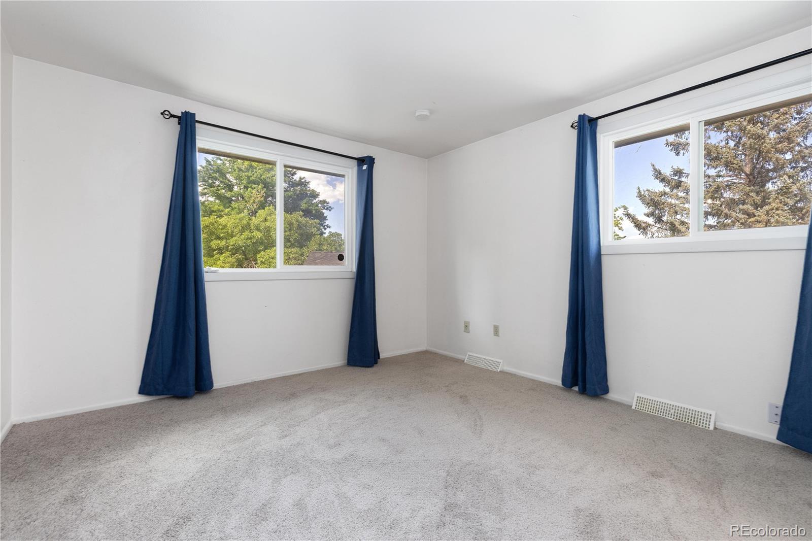 4374 East Peakview Circle Centennial, CO 80121 - Photo 16 of 45 an empty room with a window