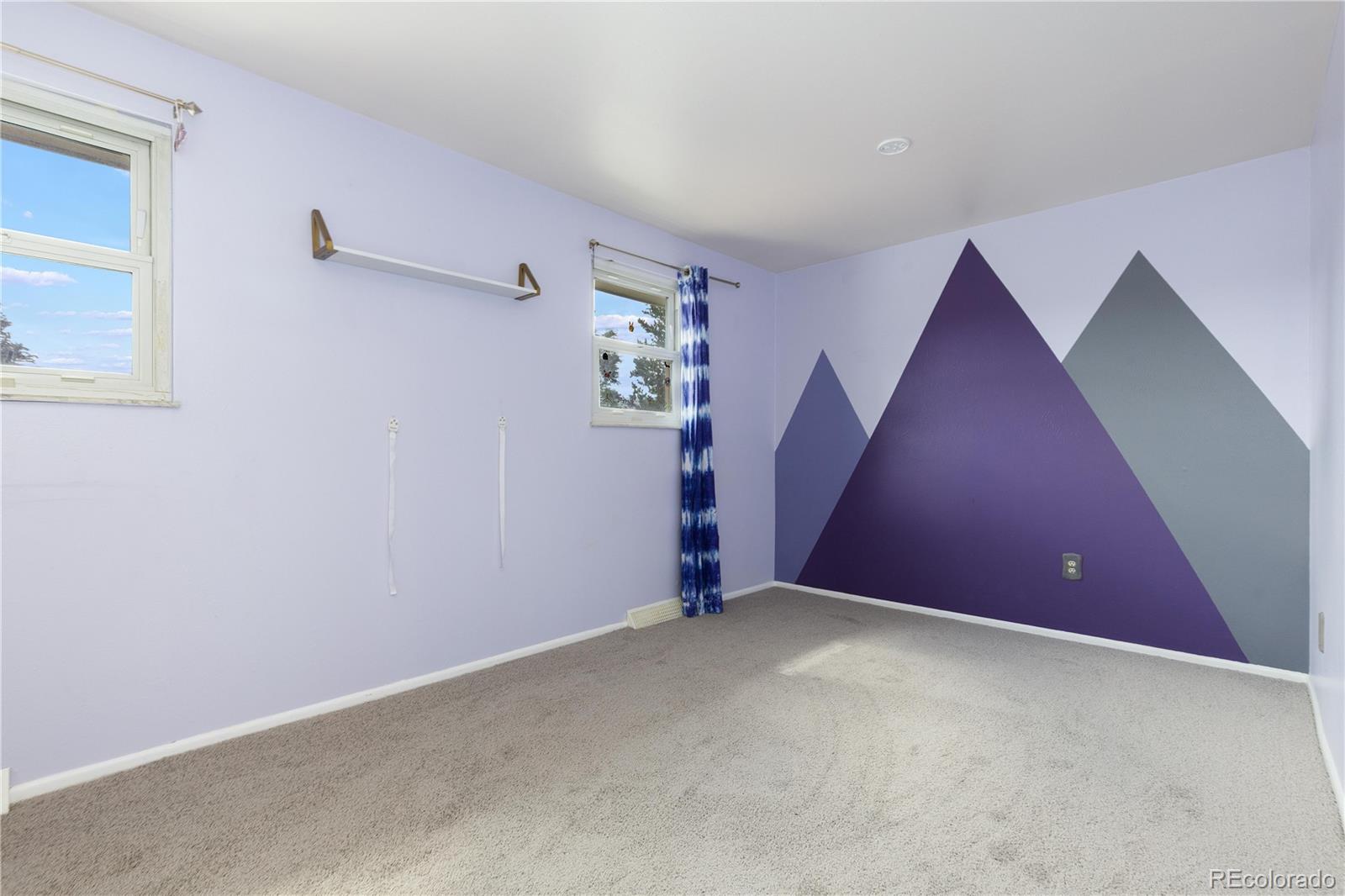 4374 East Peakview Circle Centennial, CO 80121 - Photo 25 of 45 a view of an empty room with a window