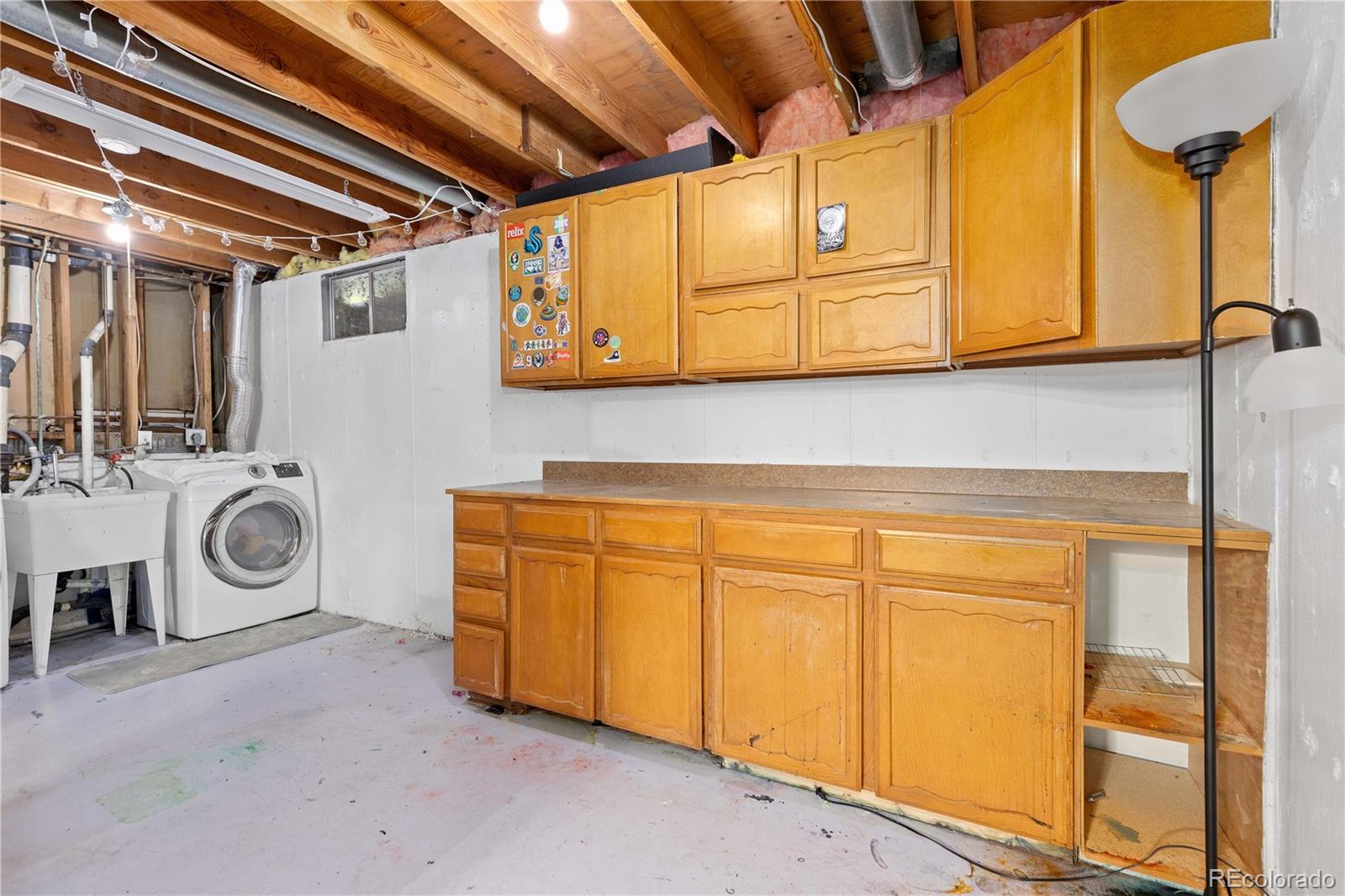 4374 East Peakview Circle Centennial, CO 80121 - Photo 31 of 45 a utility room with dryer and washer
