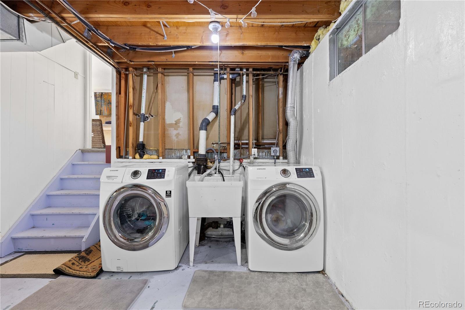 4374 East Peakview Circle Centennial, CO 80121 - Photo 32 of 45 a utility room with dryer and washer