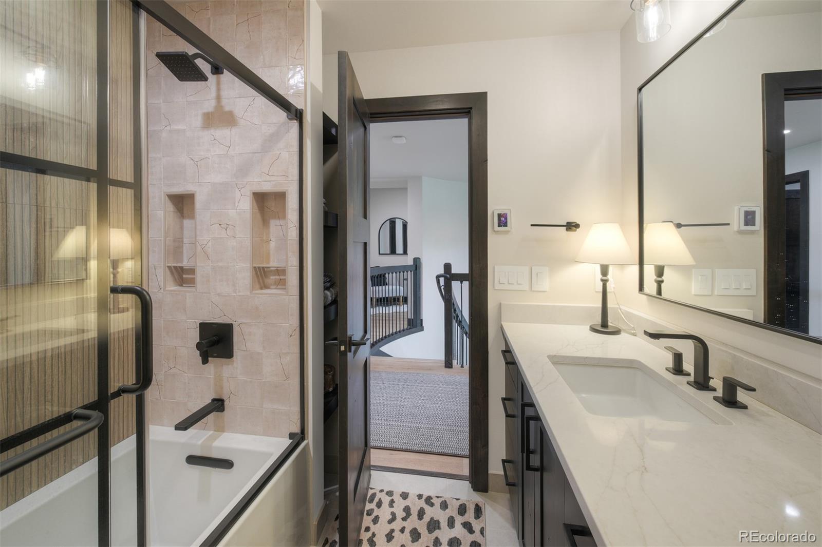 306 Golden Eagle Road Silverthorne, CO 80498 - Photo 24 of 43 a bathroom with a sink and a mirror