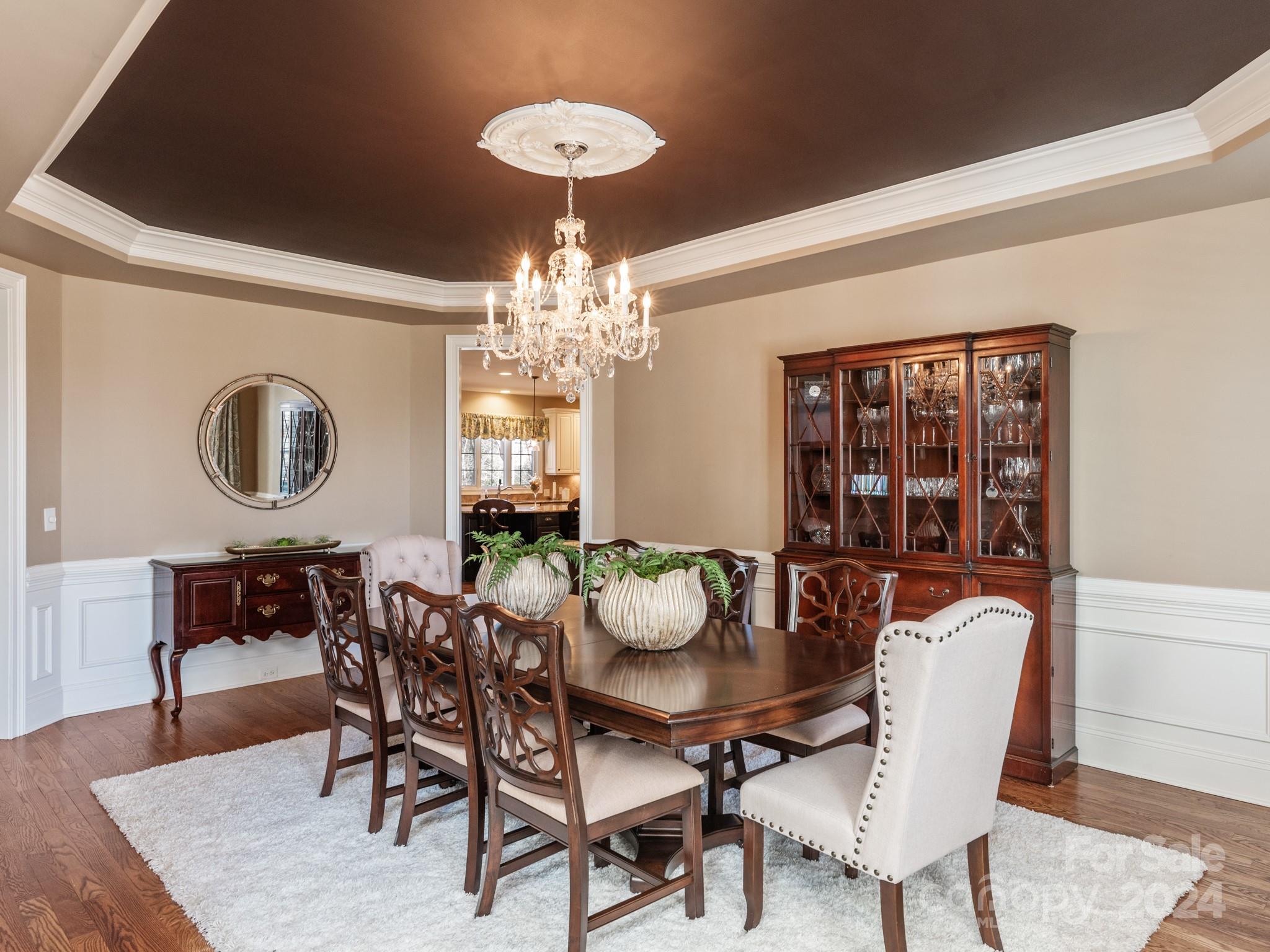 2008 Wheat Field Drive Marvin, NC 28173 - Photo 10 of 48 a view of a dining room with furniture and chandelier