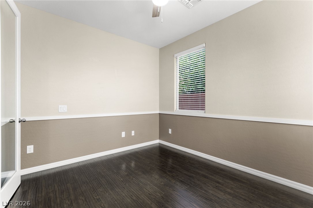 11048 Prairie Grove Road Las Vegas, NV 89179 - Photo 32 of 75 An adaptable interior space featuring attractive hardwood flooring.