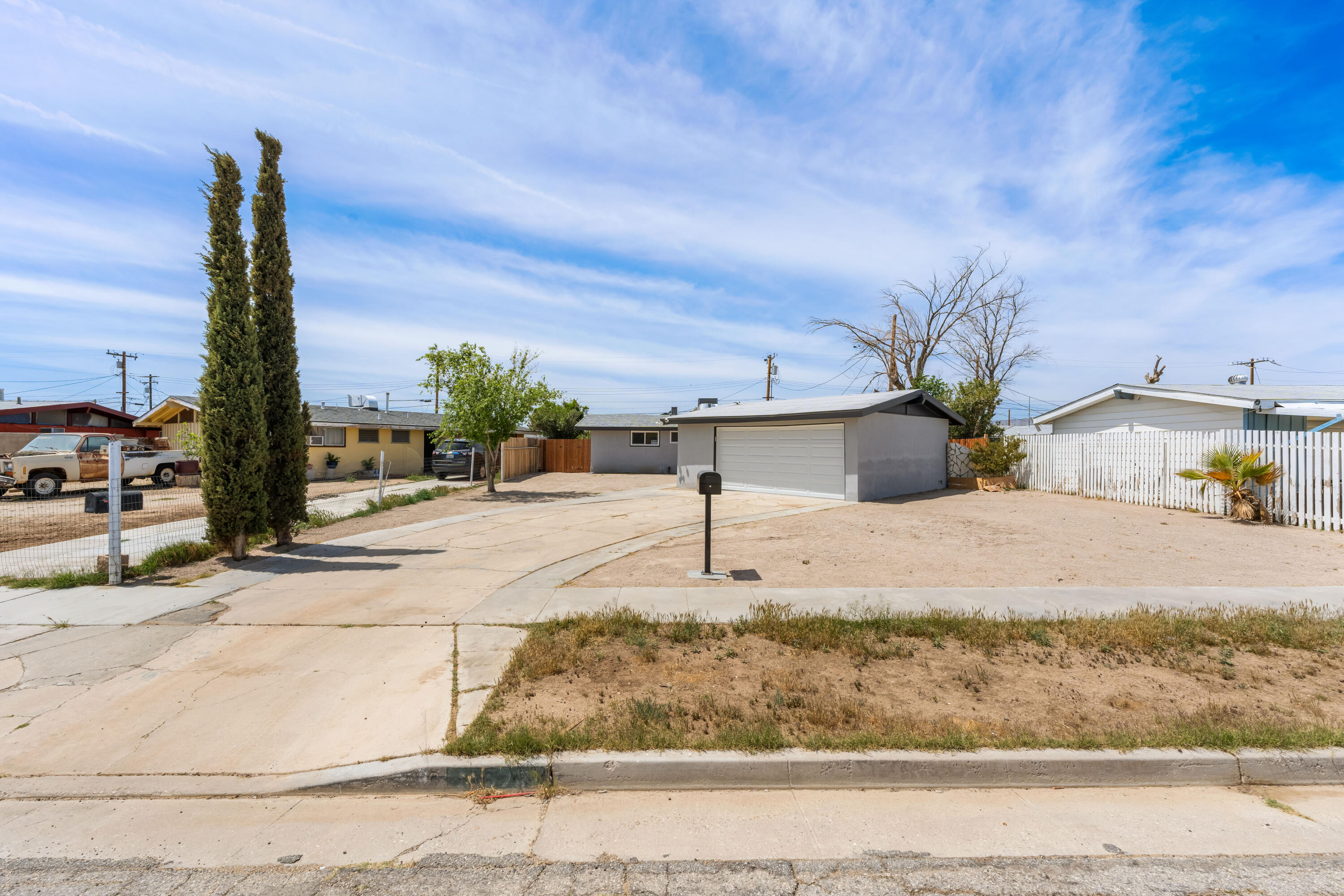 15593 M Street Mojave, CA 93501 - Photo 12 of 53 a view of a yard with utility pole