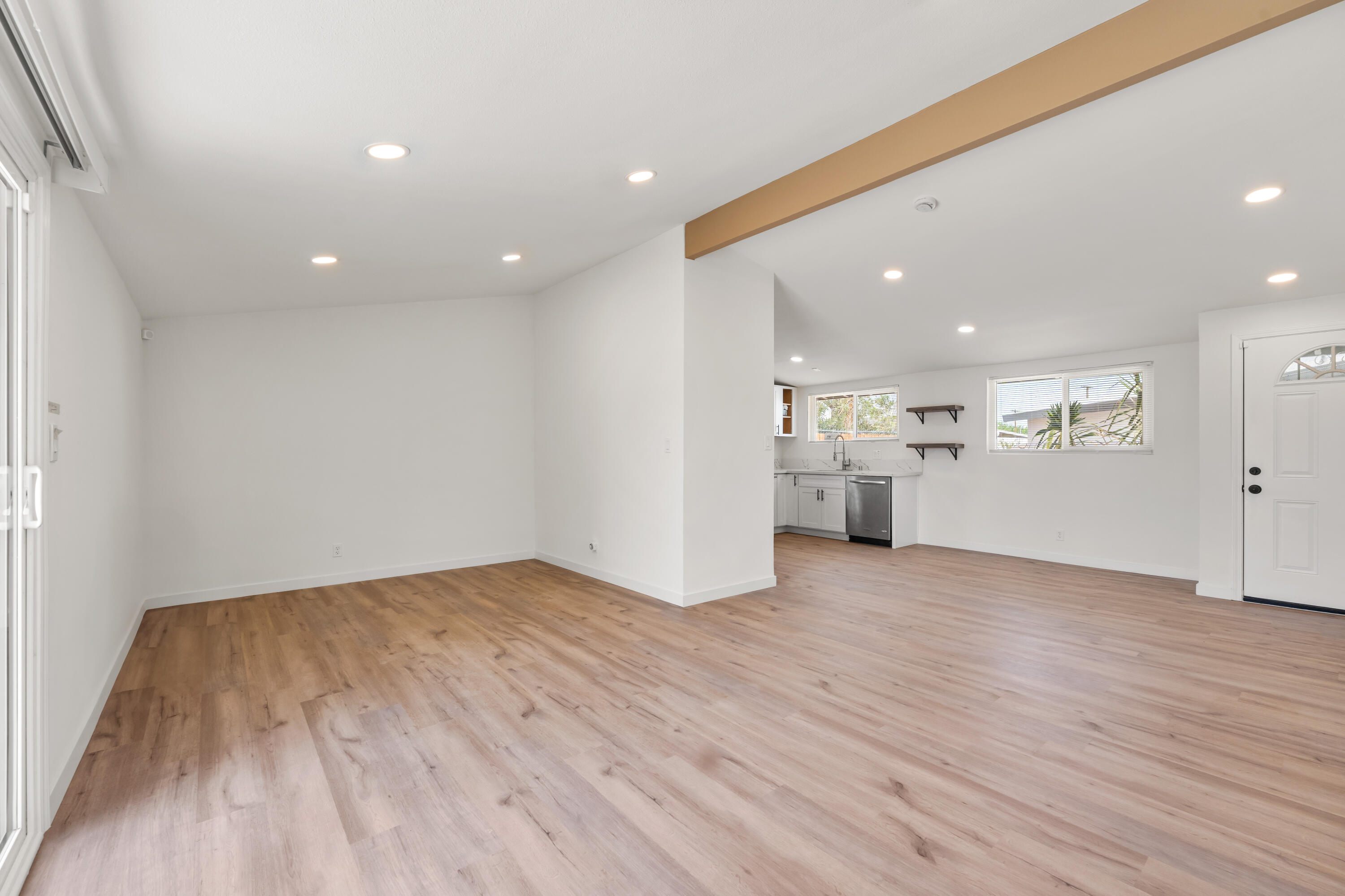 15593 M Street Mojave, CA 93501 - Photo 25 of 53 a view of a big room with wooden floor and windows