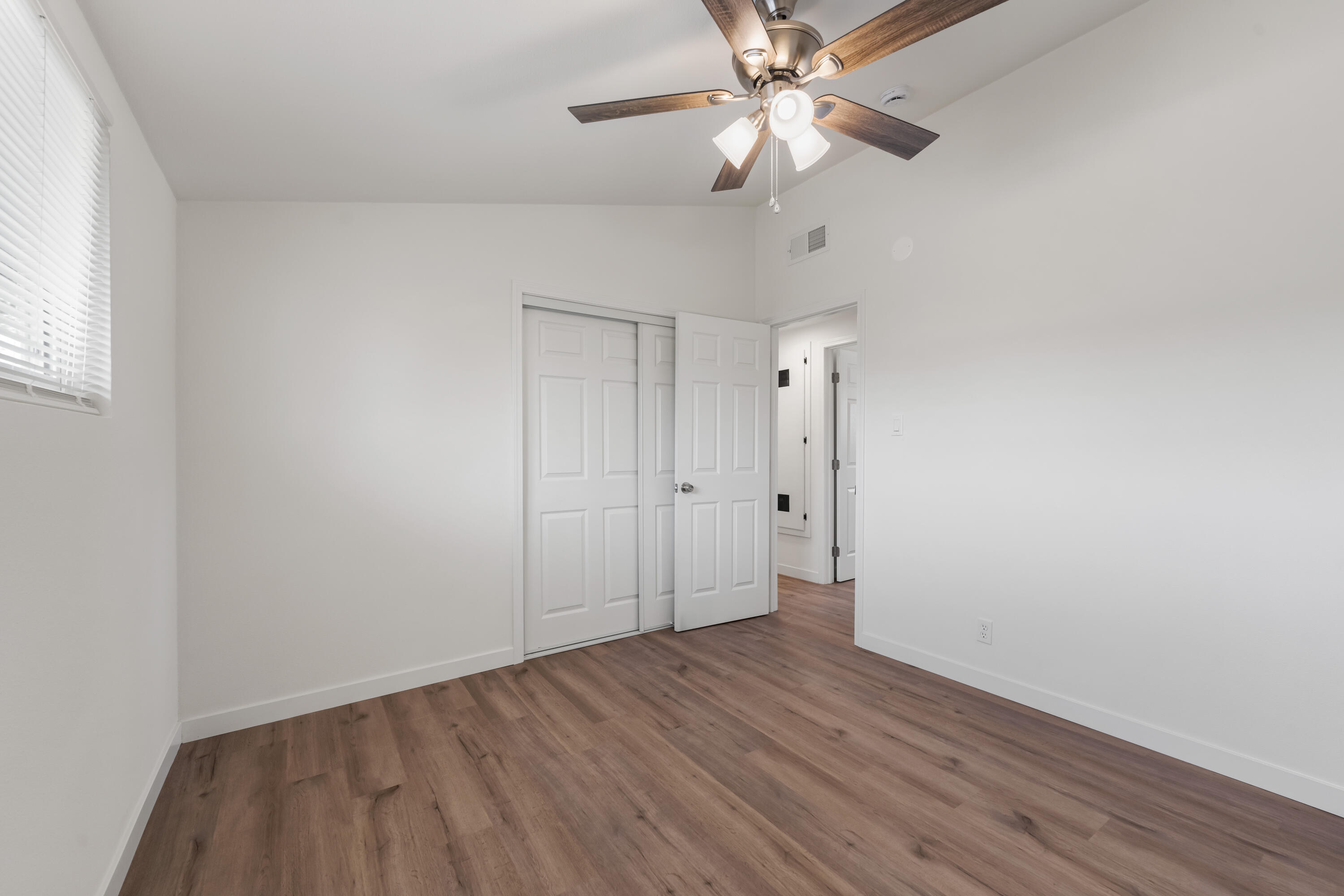 15593 M Street Mojave, CA 93501 - Photo 32 of 53 wooden floor in an empty room
