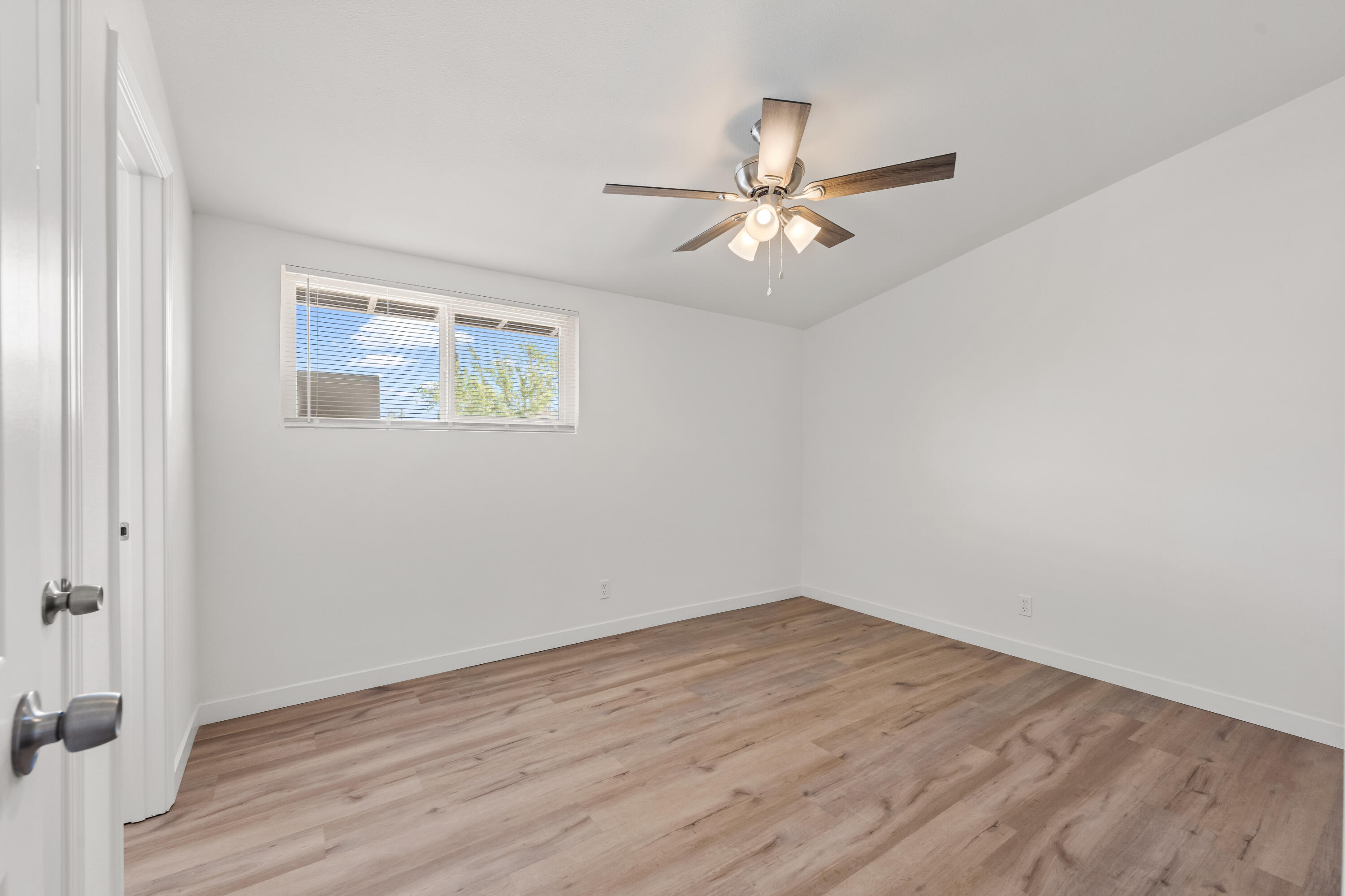 15593 M Street Mojave, CA 93501 - Photo 35 of 53 a view of empty room with wooden floor