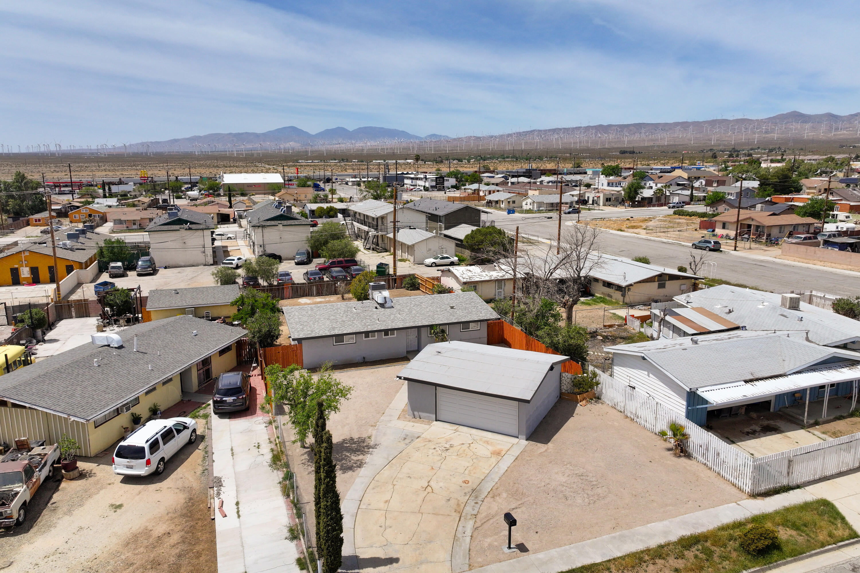 15593 M Street Mojave, CA 93501 - Photo 48 of 53 an aerial view of a city with lots of residential buildings