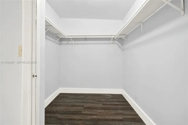 a view of an empty walk in closet