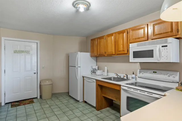 $850,000 | 115 Weirs Road, Unit 109B, Gilford, NH 03249