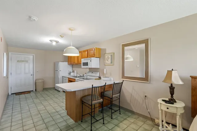 $850,000 | 115 Weirs Road, Unit 109B, Gilford, NH 03249