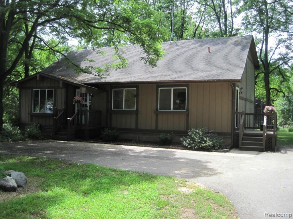 9202 Lee Road Brighton, MI 48116 - Photo 1 of 33 1-Cover.jpg
