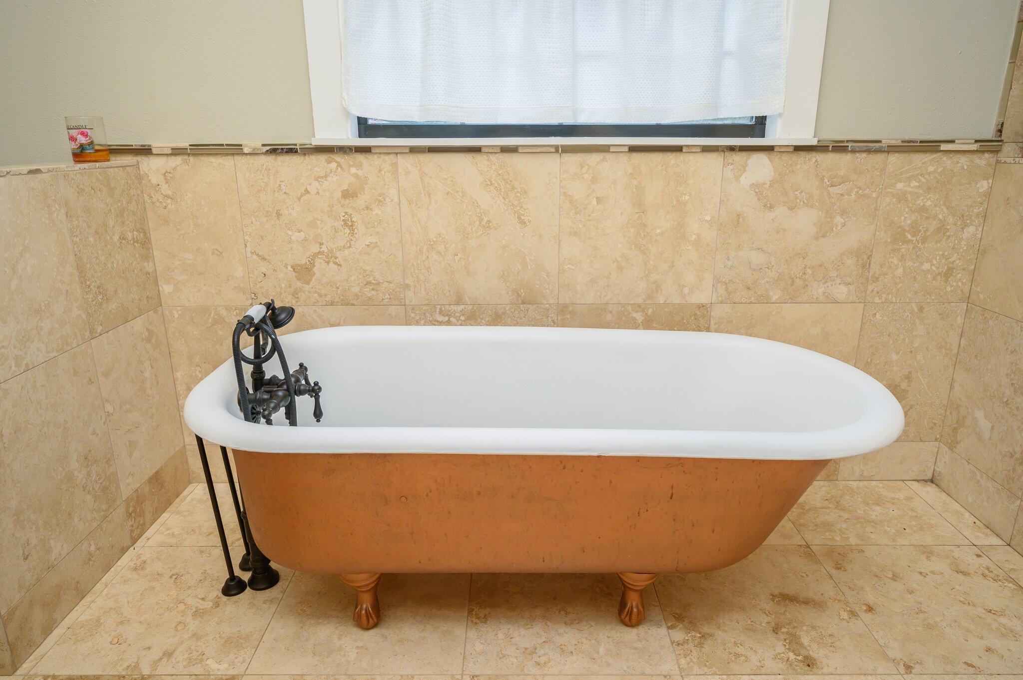 610 Jones Road Crestview, FL 32536 - Photo 27 of 39 a white bath tub sitting in a bathroom