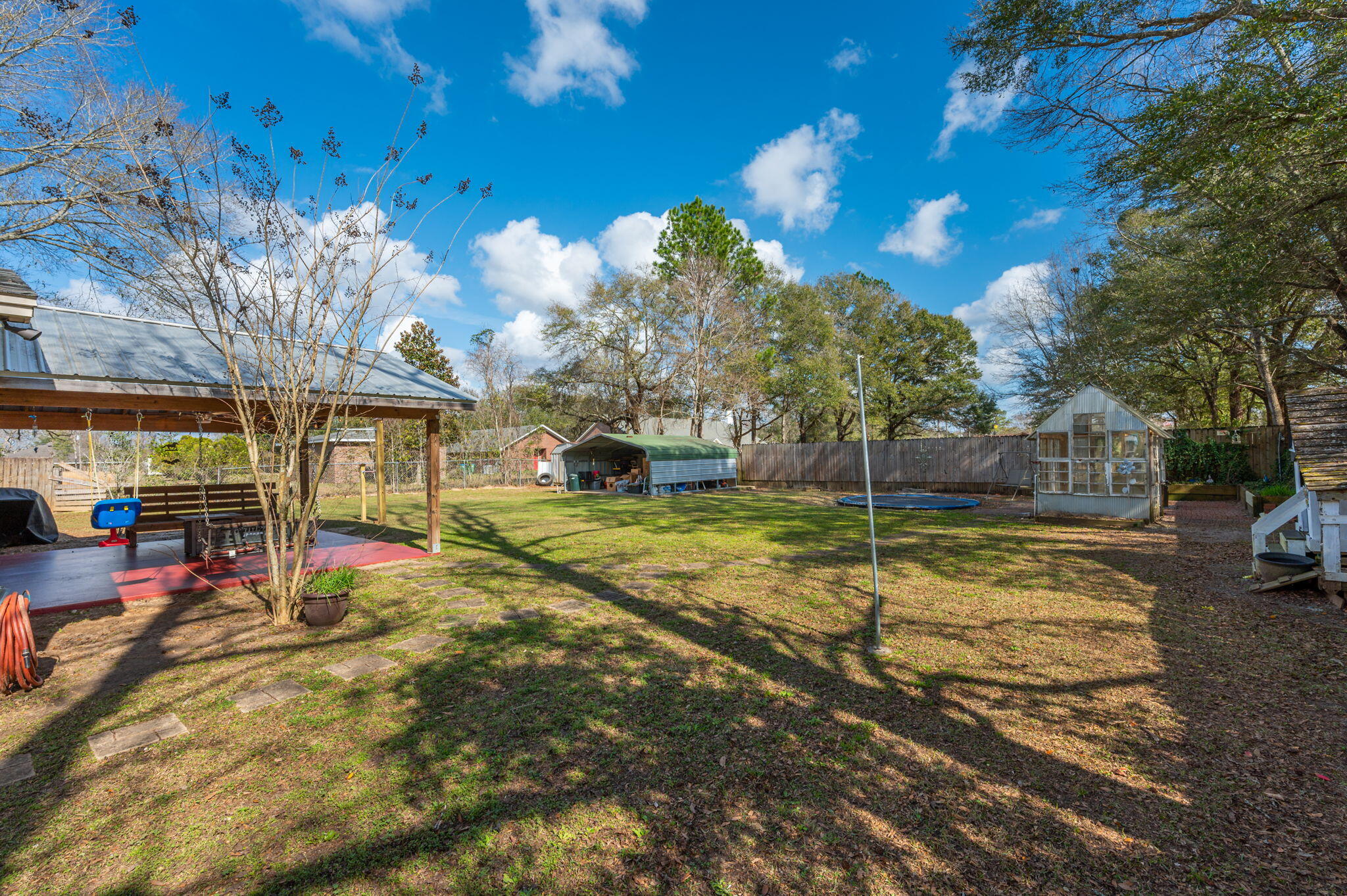 610 Jones Road Crestview, FL 32536 - Photo 35 of 39 a view of a playground with basketball court