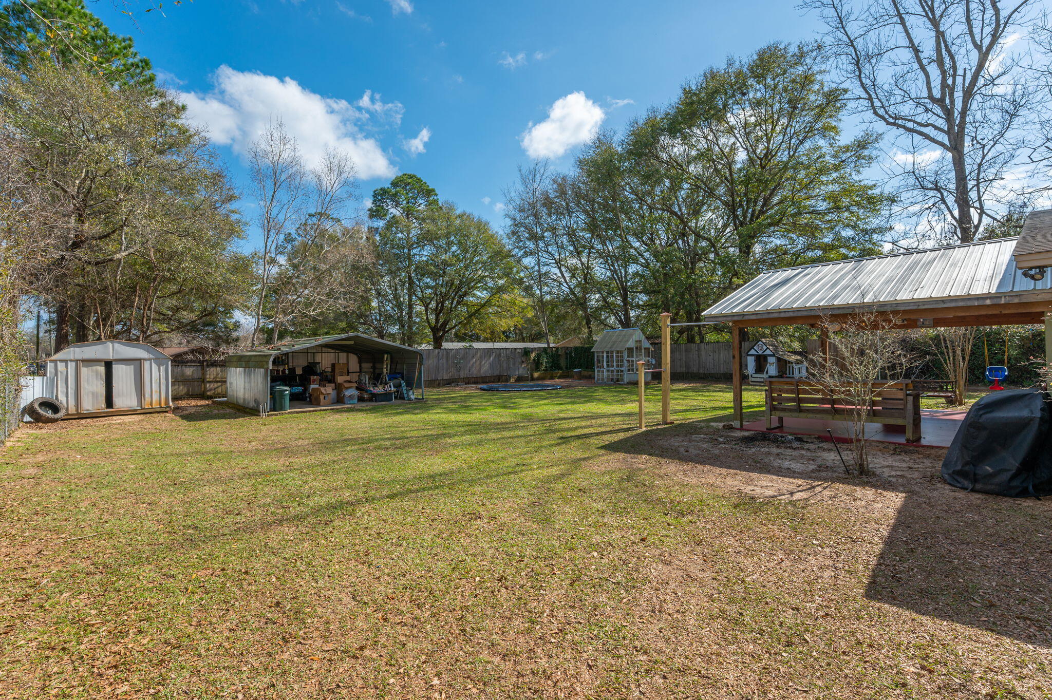 610 Jones Road Crestview, FL 32536 - Photo 39 of 39 a view of a house with backyard and sitting area