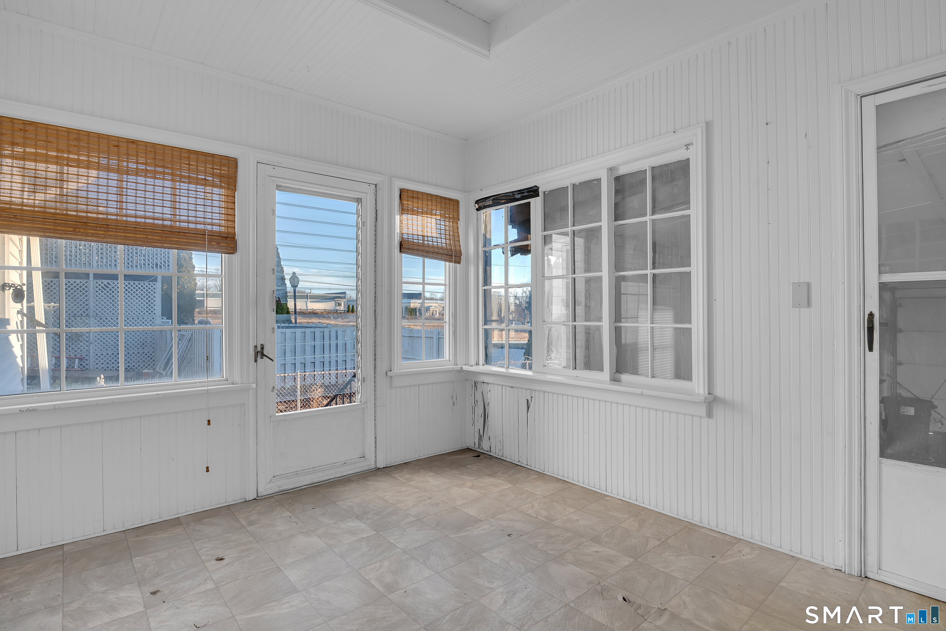 an empty room with windows