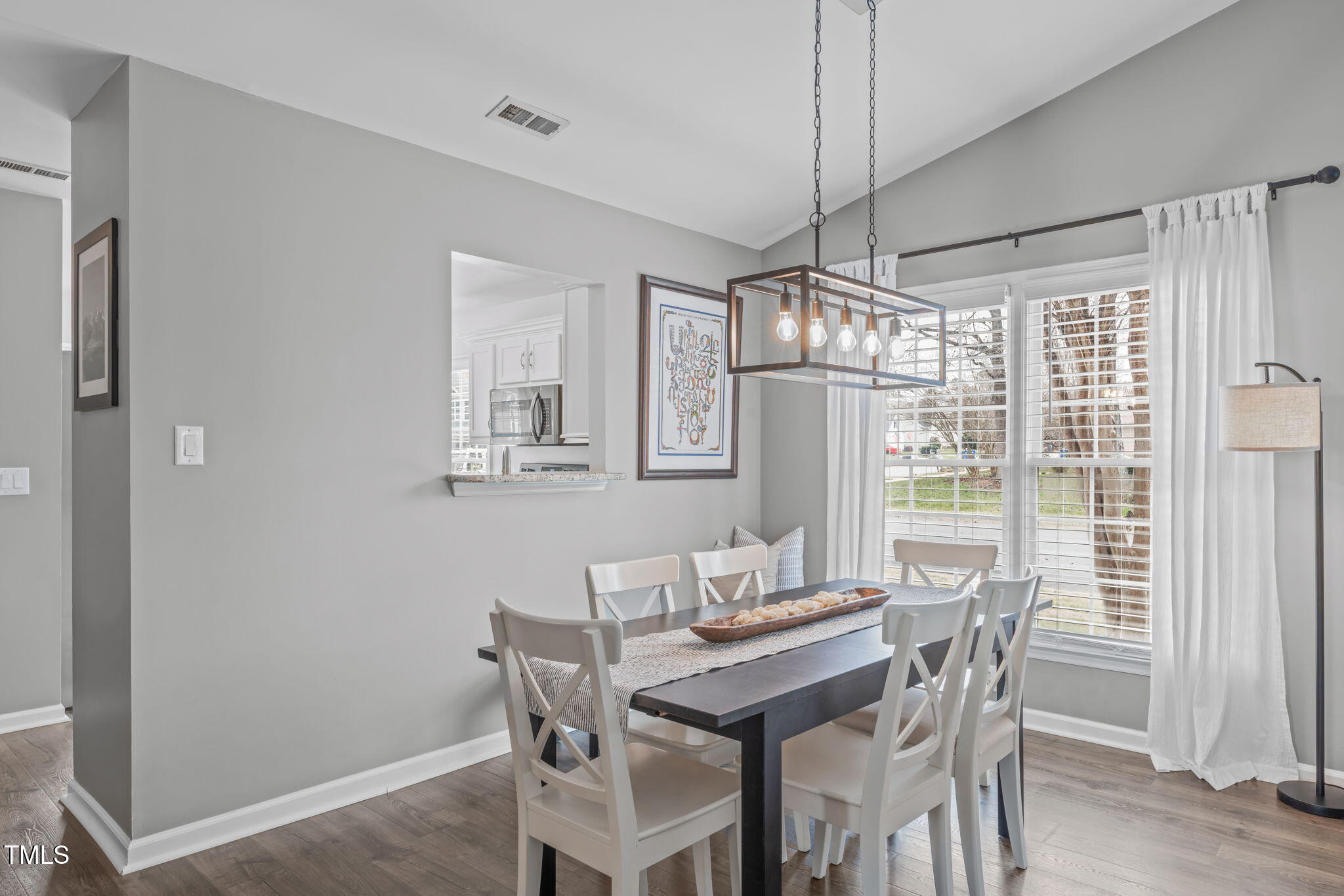 11228 North Radner Way Raleigh, NC 27613 - Photo 12 of 34 a view of a dining room with furniture window and outside view