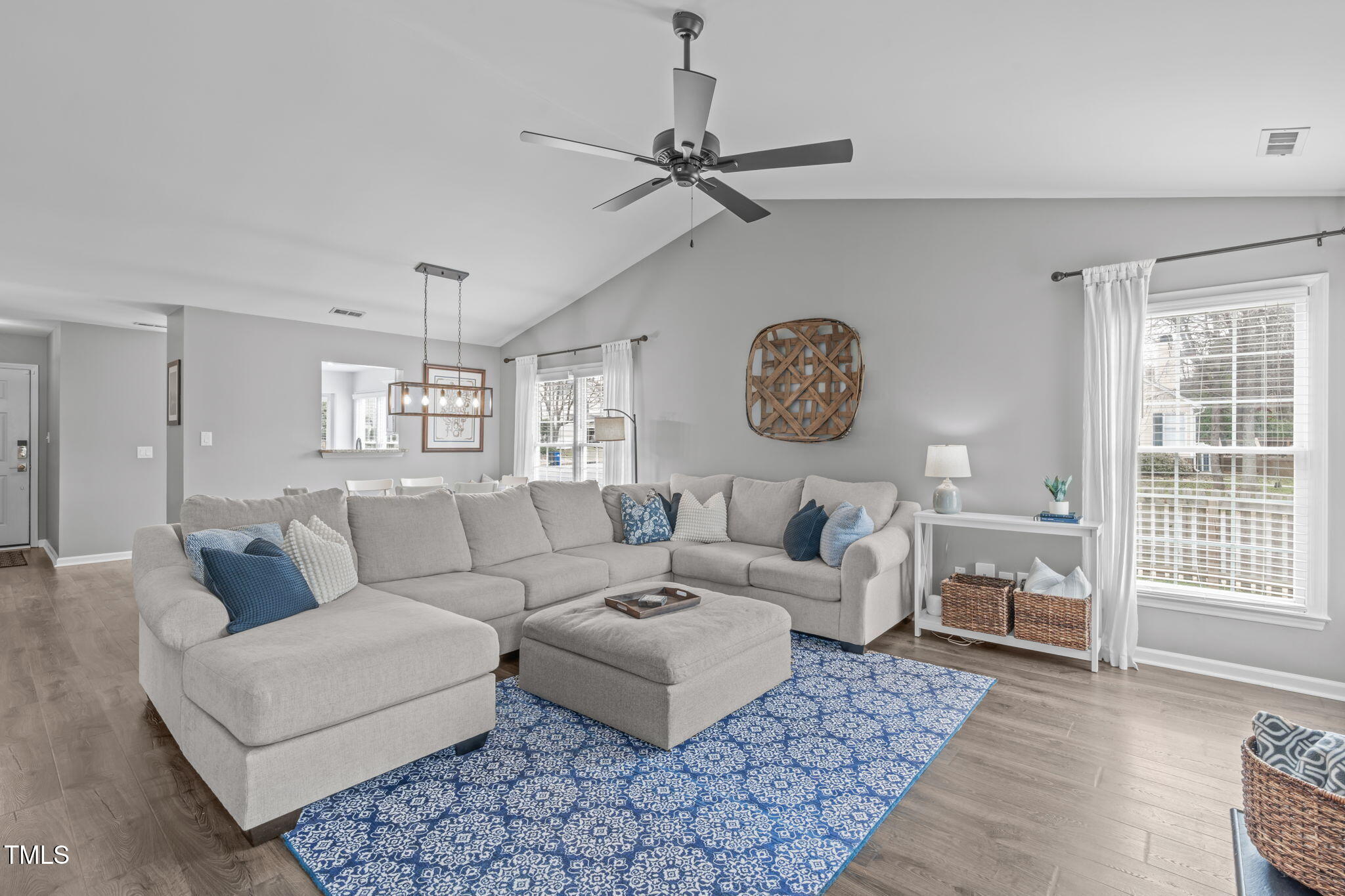 11228 North Radner Way Raleigh, NC 27613 - Photo 15 of 34 a living room with furniture and a window