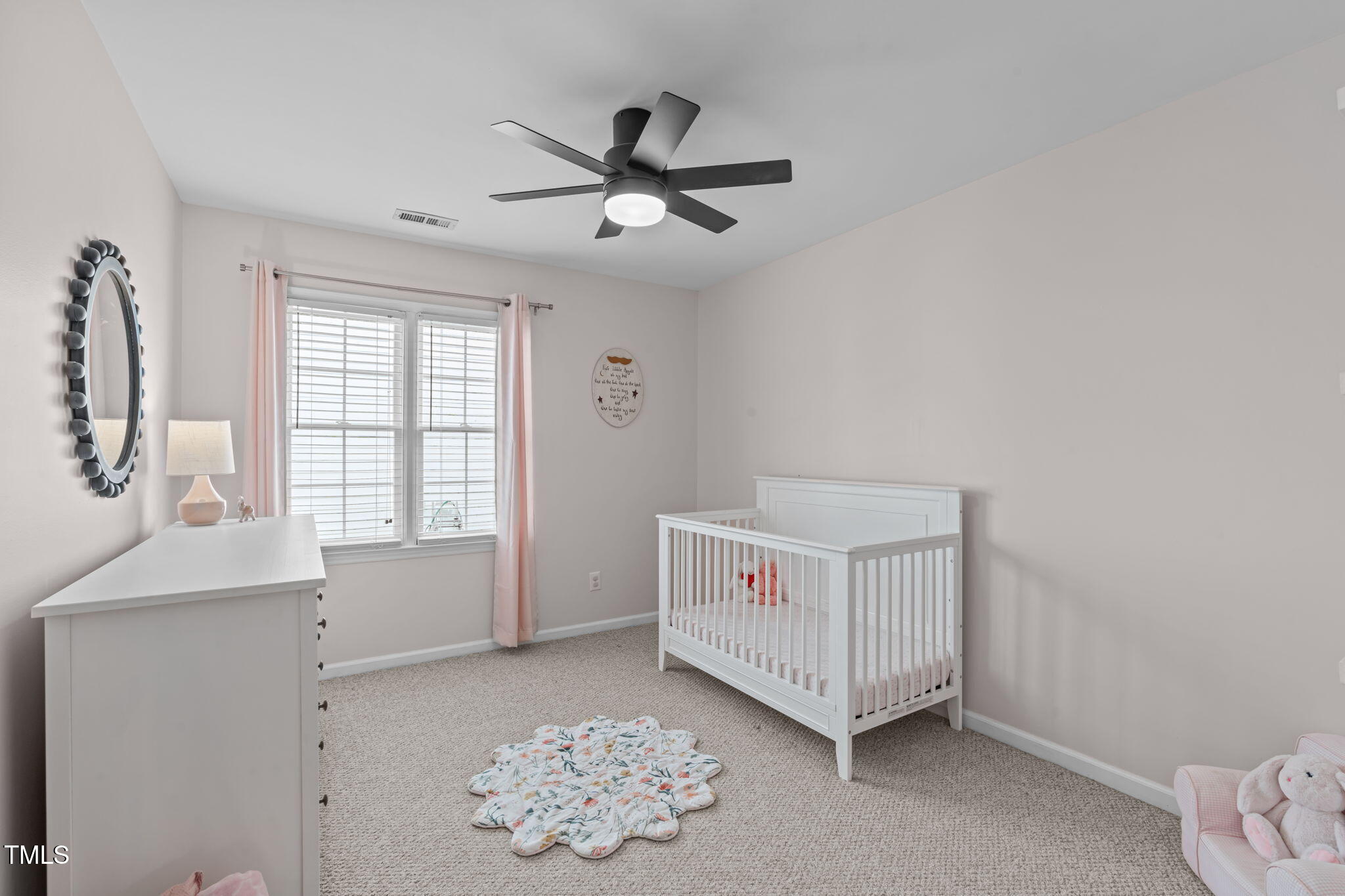 11228 North Radner Way Raleigh, NC 27613 - Photo 23 of 34 a room with a bed and a window
