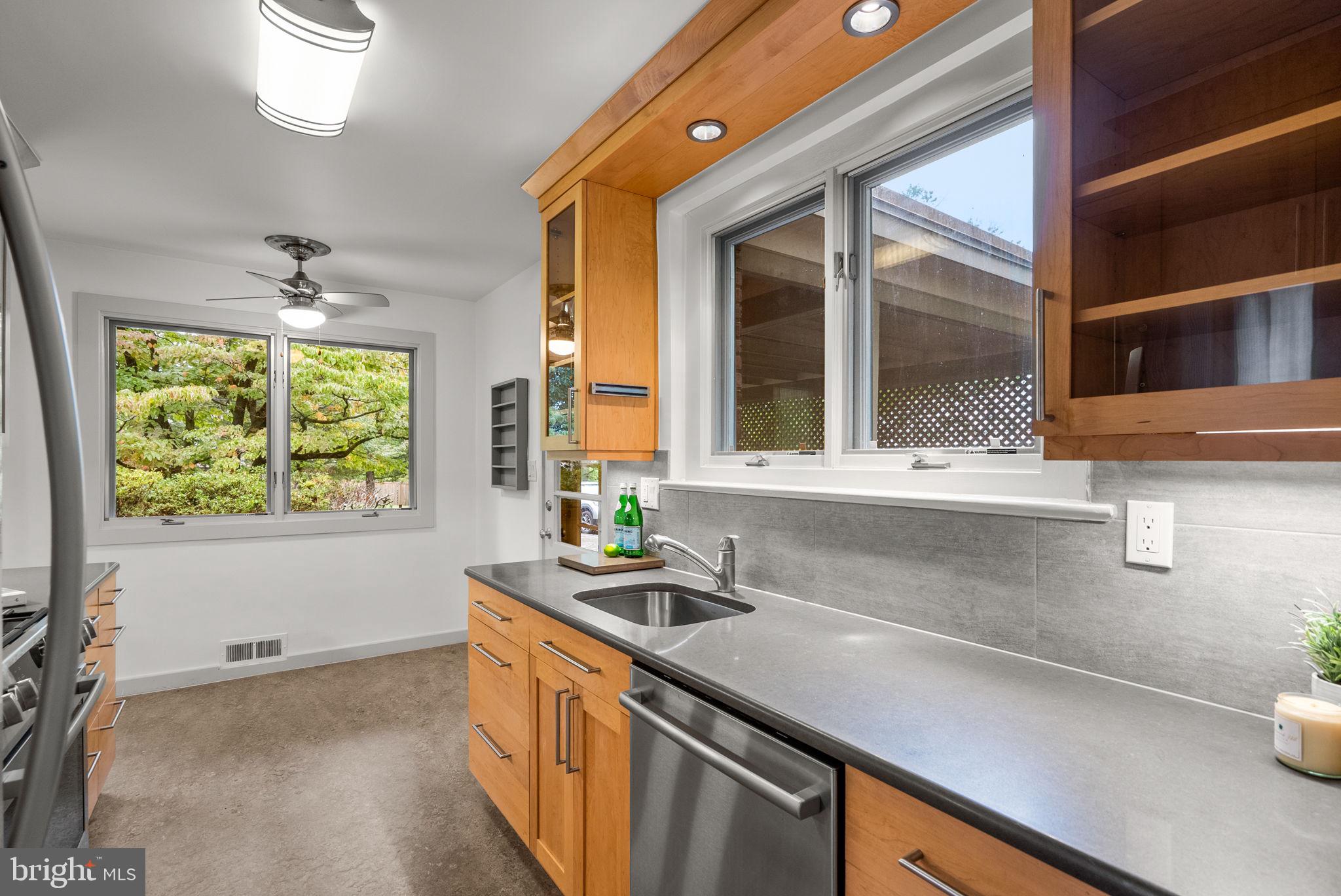 9109 Fairview Road Silver Spring, MD 20910 - Photo 15 of 46 a kitchen with a sink and a window