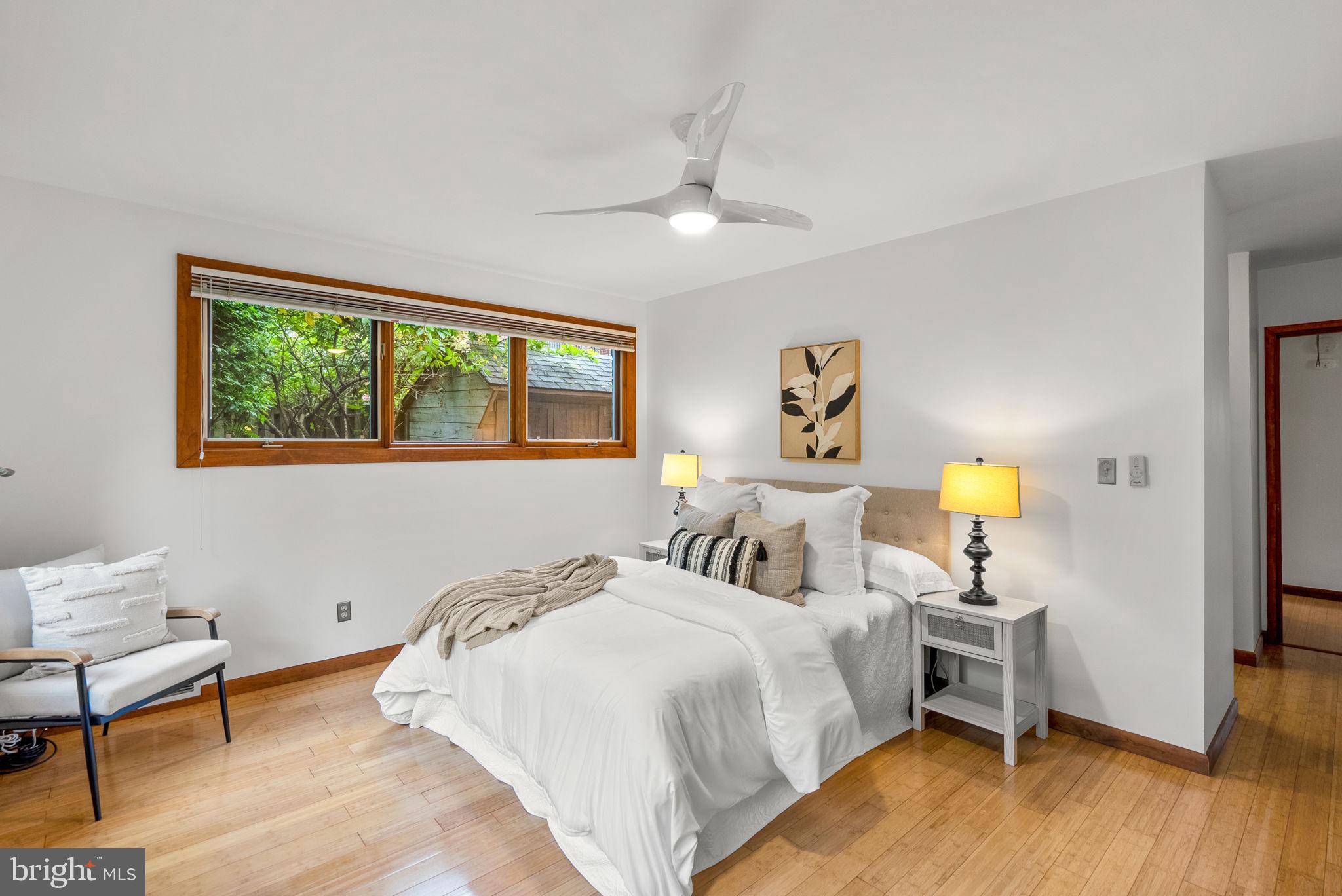 9109 Fairview Road Silver Spring, MD 20910 - Photo 20 of 46 a bedroom with double bed and a window
