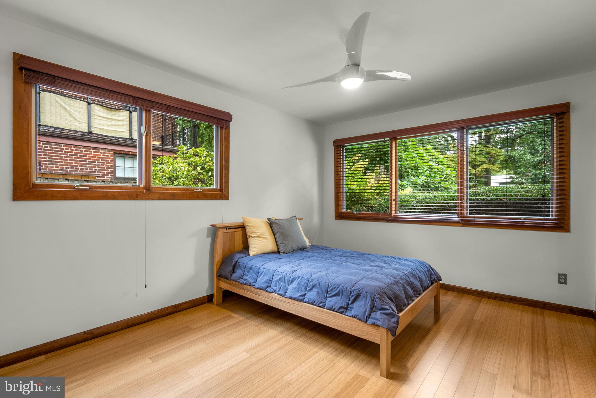 9109 Fairview Road Silver Spring, MD 20910 - Photo 25 of 46 a bedroom with a bed and window