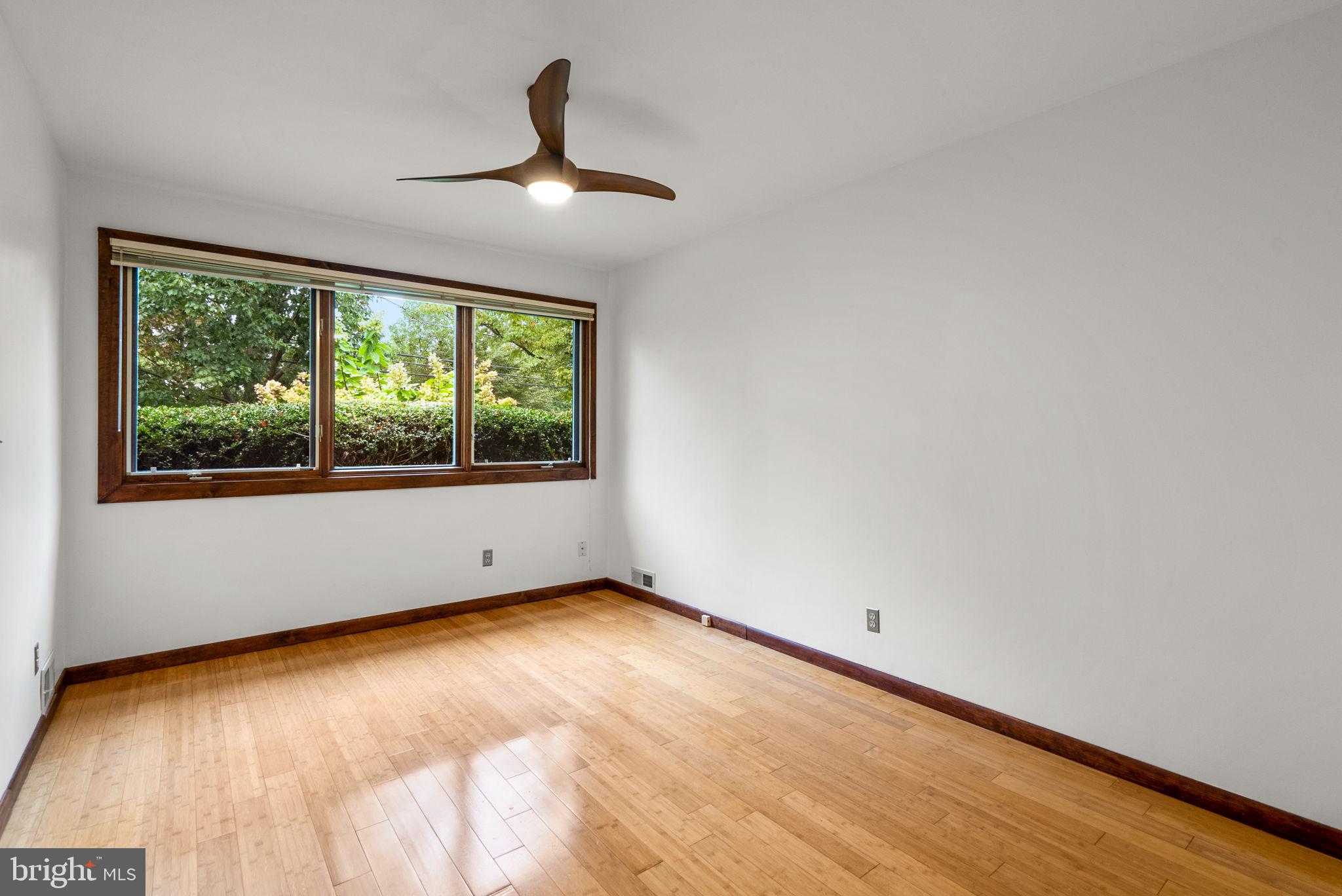 9109 Fairview Road Silver Spring, MD 20910 - Photo 27 of 46 a view of an empty room with a window